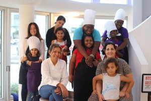 Group photo of Mom's and kids at Mommy and Me class